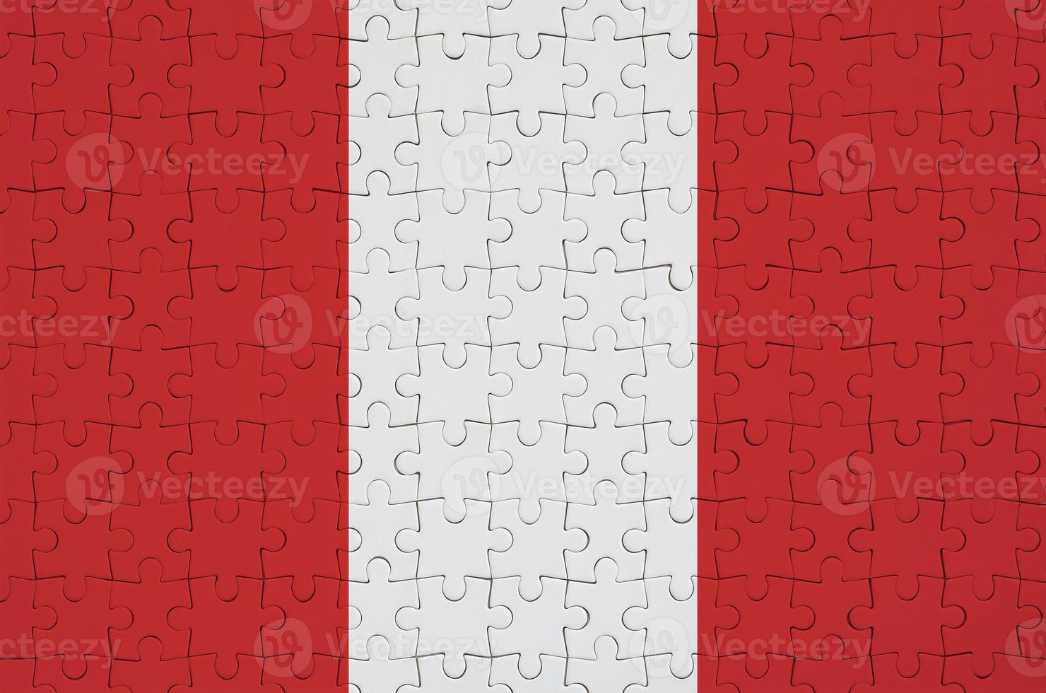 Peru flag  is depicted on a folded puzzle photo