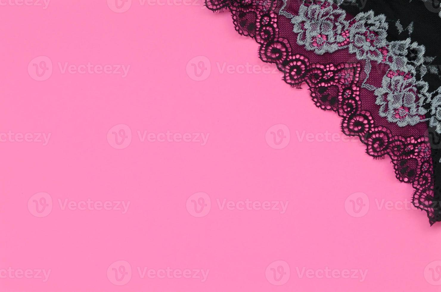 Black women underwear with lace on pink background with copy space. Beauty fashion blogger concept. Romantic lingerie for Valentines day temptation photo