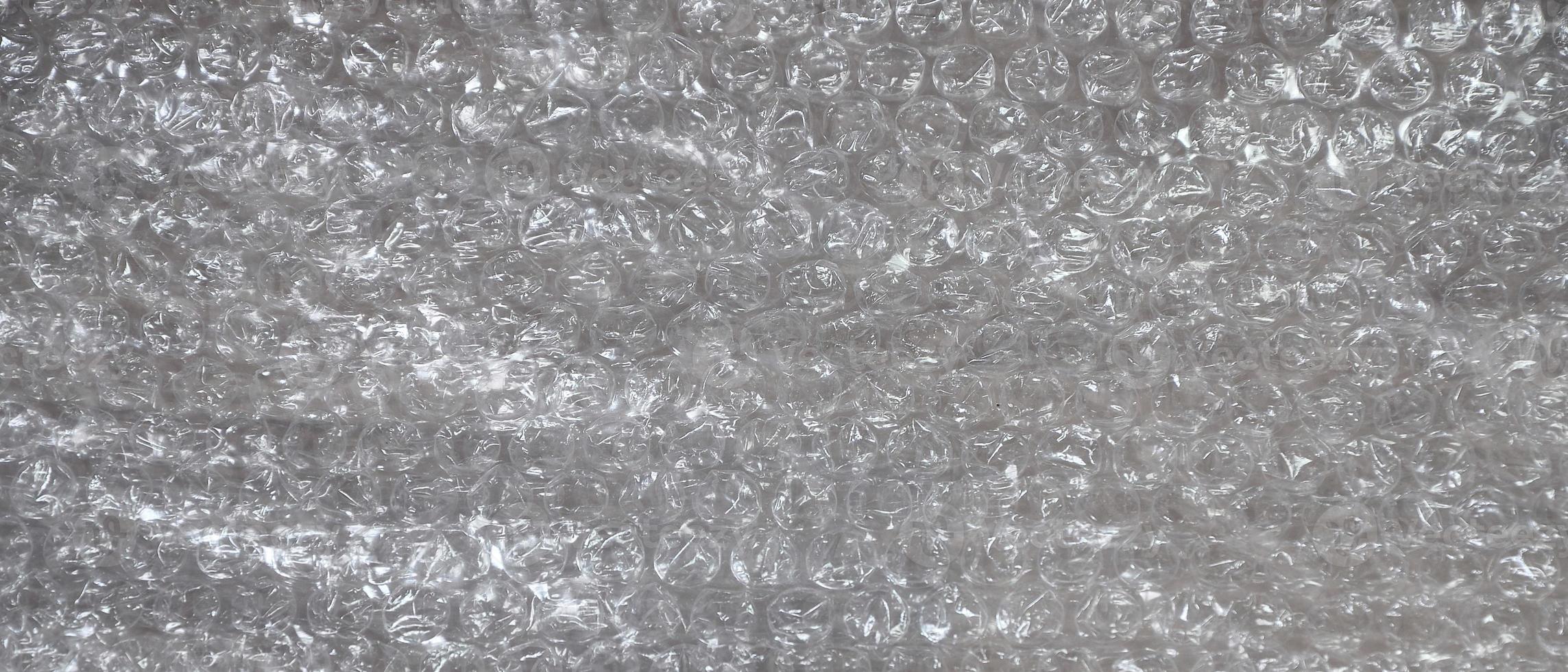 White bubble Wrap Packing Or Air Cushion material. Abstract Texture For Creative Art Work, Close Up dfckground, Top View with Copy Space photo