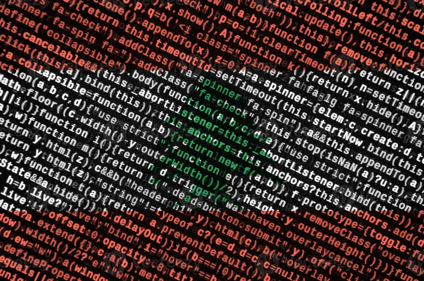 Lebanon flag  is depicted on the screen with the program code. The concept of modern technology and site development photo