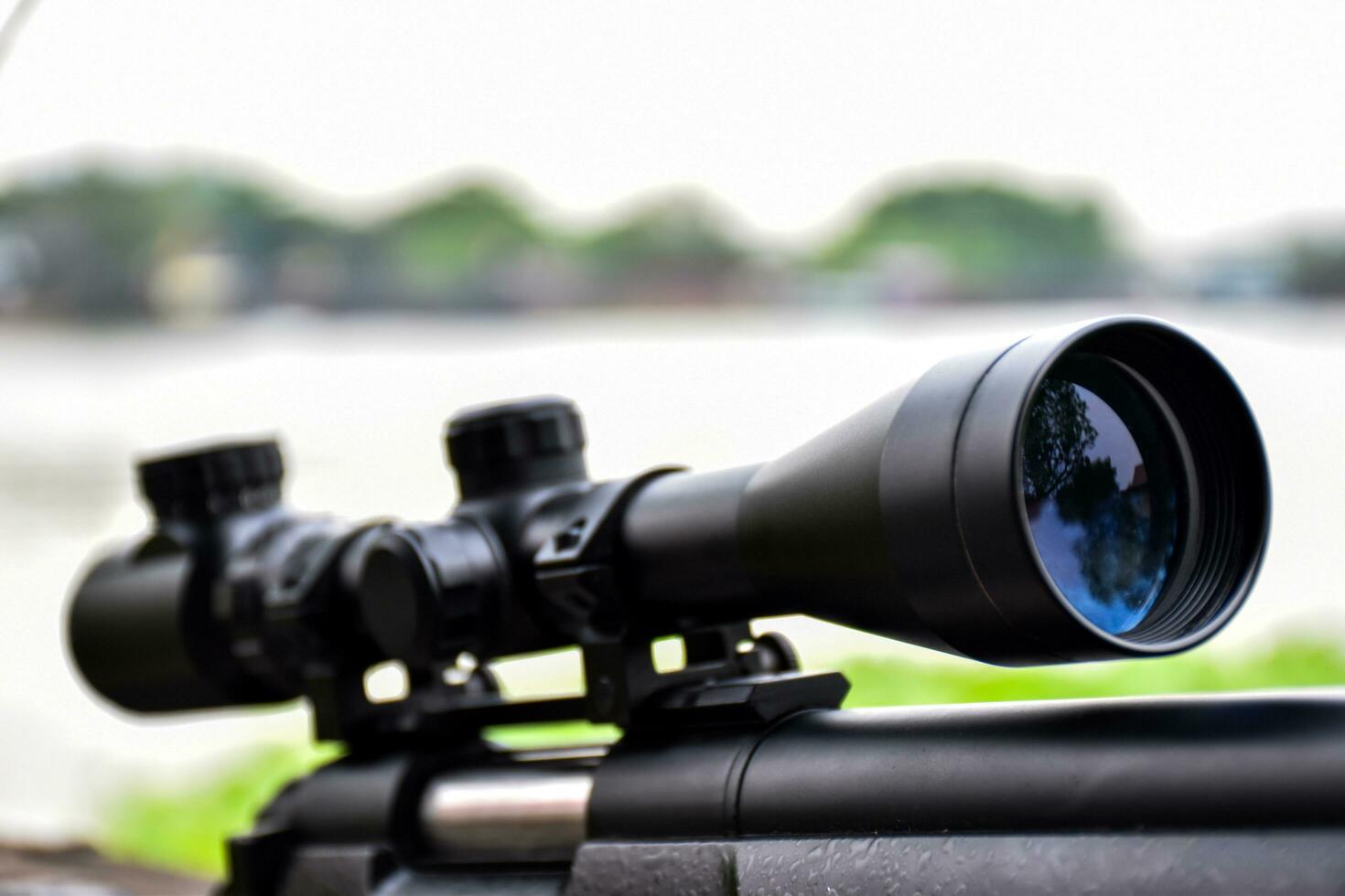 Rifle with a scope and bipod photo