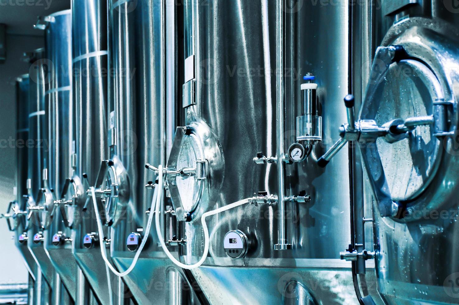 Small beer fermentation tank in temperature control room photo
