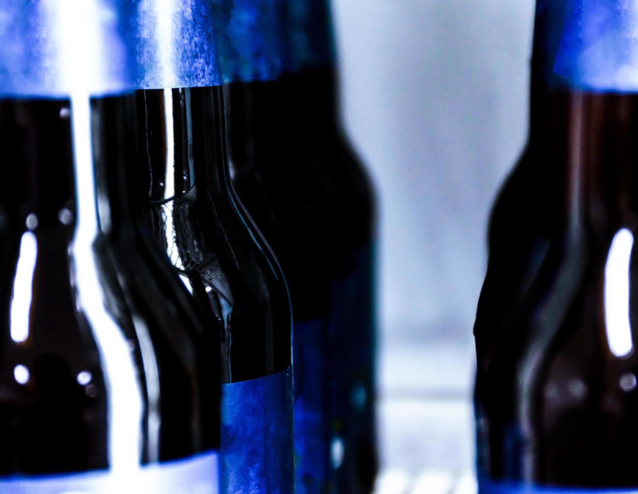 Close up Beer bottle without logo in refrigerator photo