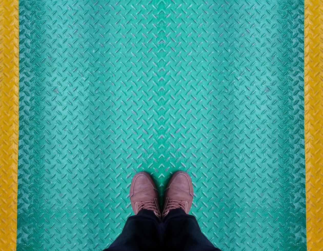 Man standing on the ground epoxy. copy space. photo