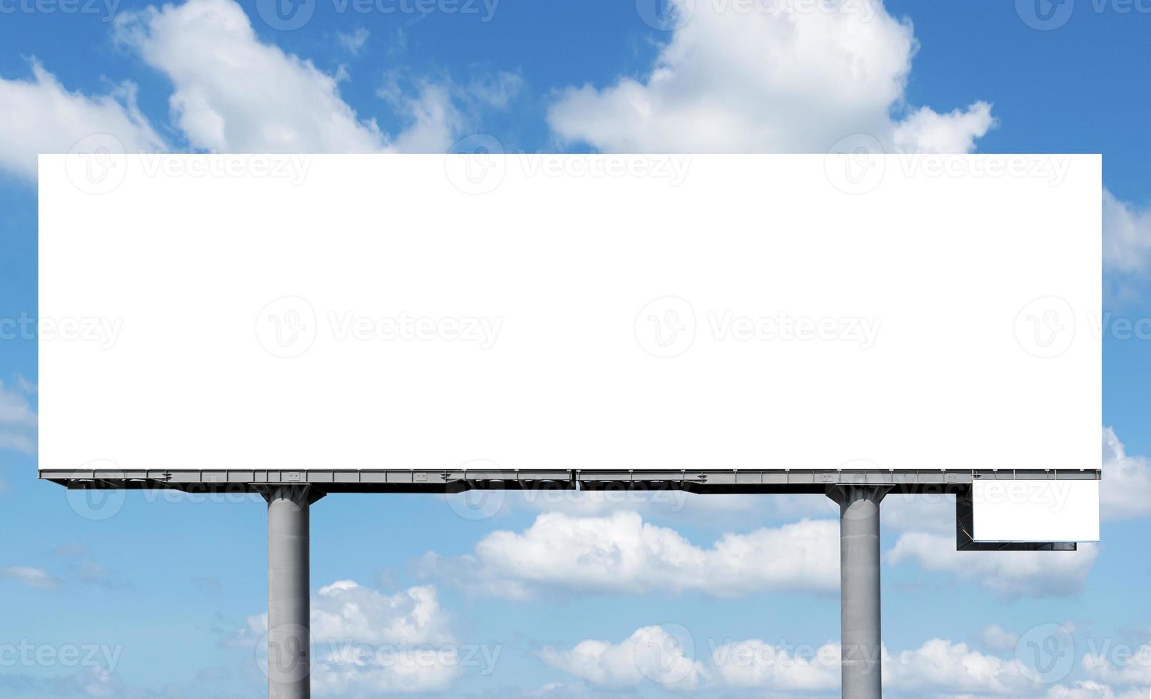 Outdoor billboard on blue sky background with clipping path photo