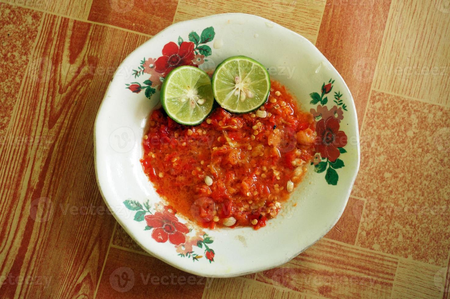 Sambal terasi jeruk nipis or Lime shrimp paste sauce tastes is good, suitable for grilled fish and vegetables. photo