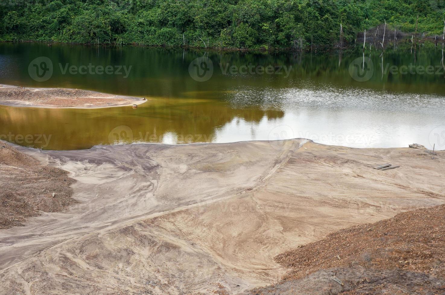 The Impact of coal mining on the environment. The mining location was abandoned without reclamation. Location at Sangatta, East Kalimantan, Indonesia. photo