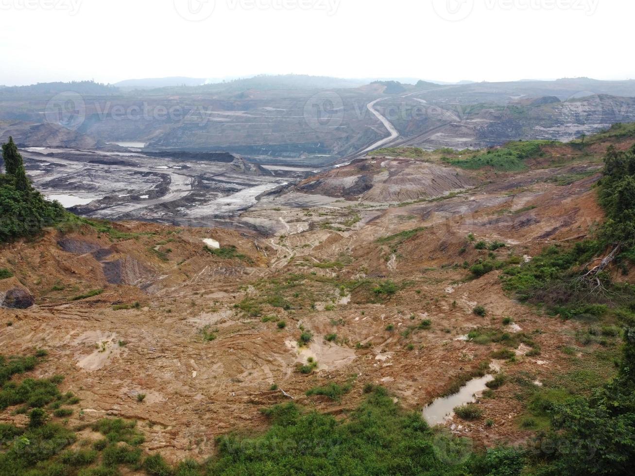 East Kutai, East Kalimantan, Indonesia, 2022 - Arial View of open pit coal mining photo