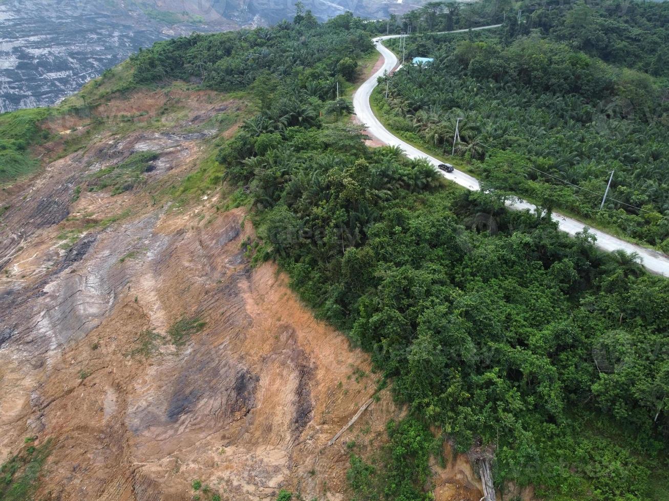 landslides on the trans provincial road due to coal mining activities. Trans provincial road east kalimantan. sub-district Sangatta to bengalon. photo