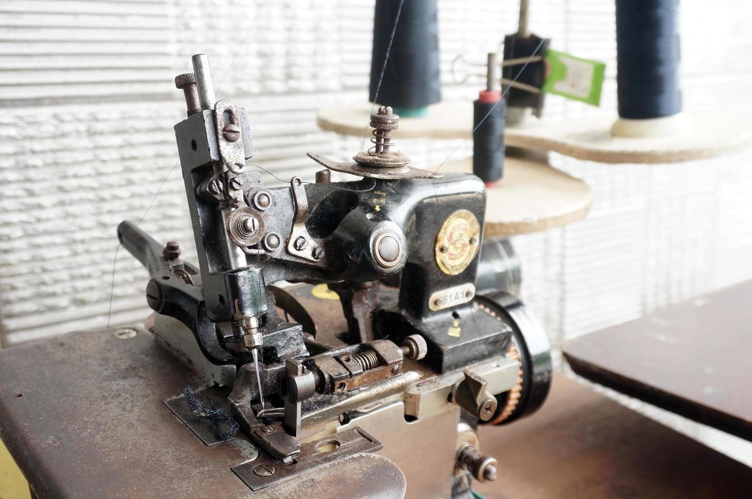 East Kutai, East Kalimantan, Indonesia, 2022 - old Overlock Sewing Machine photo