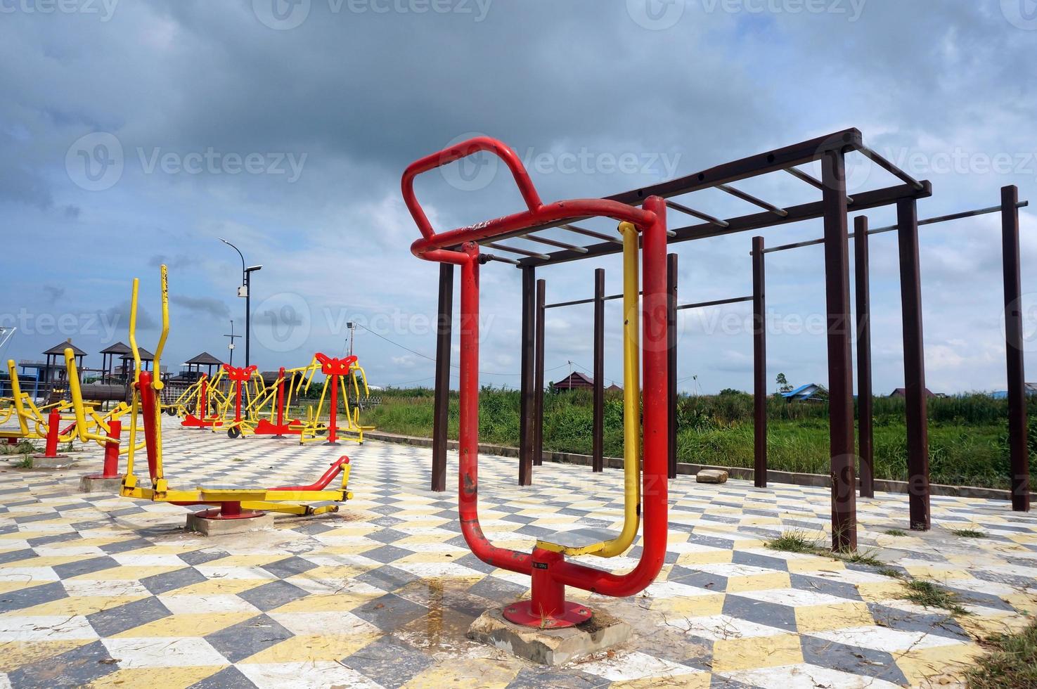 Sports simulators on the playground, horizontal bars and other equipment. Sports ground. photo