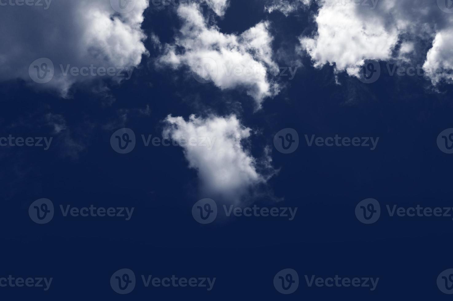 Dramatic Blue sky background with white clouds photo