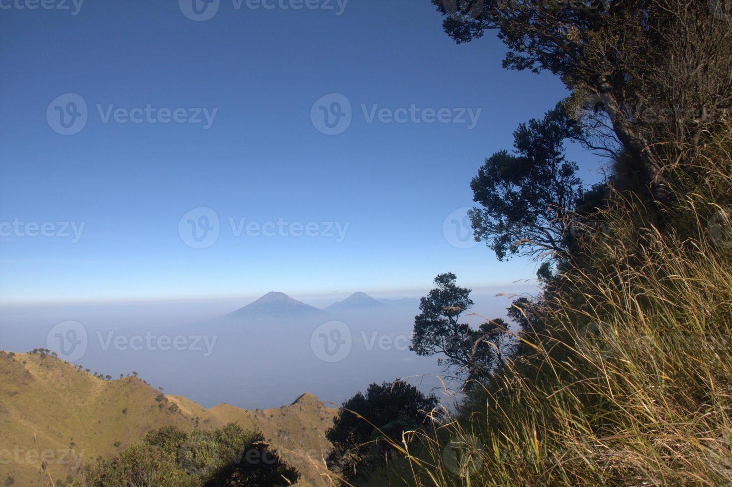 View from the merbabu mountain hiking trail. Central Java, Indonesia photo