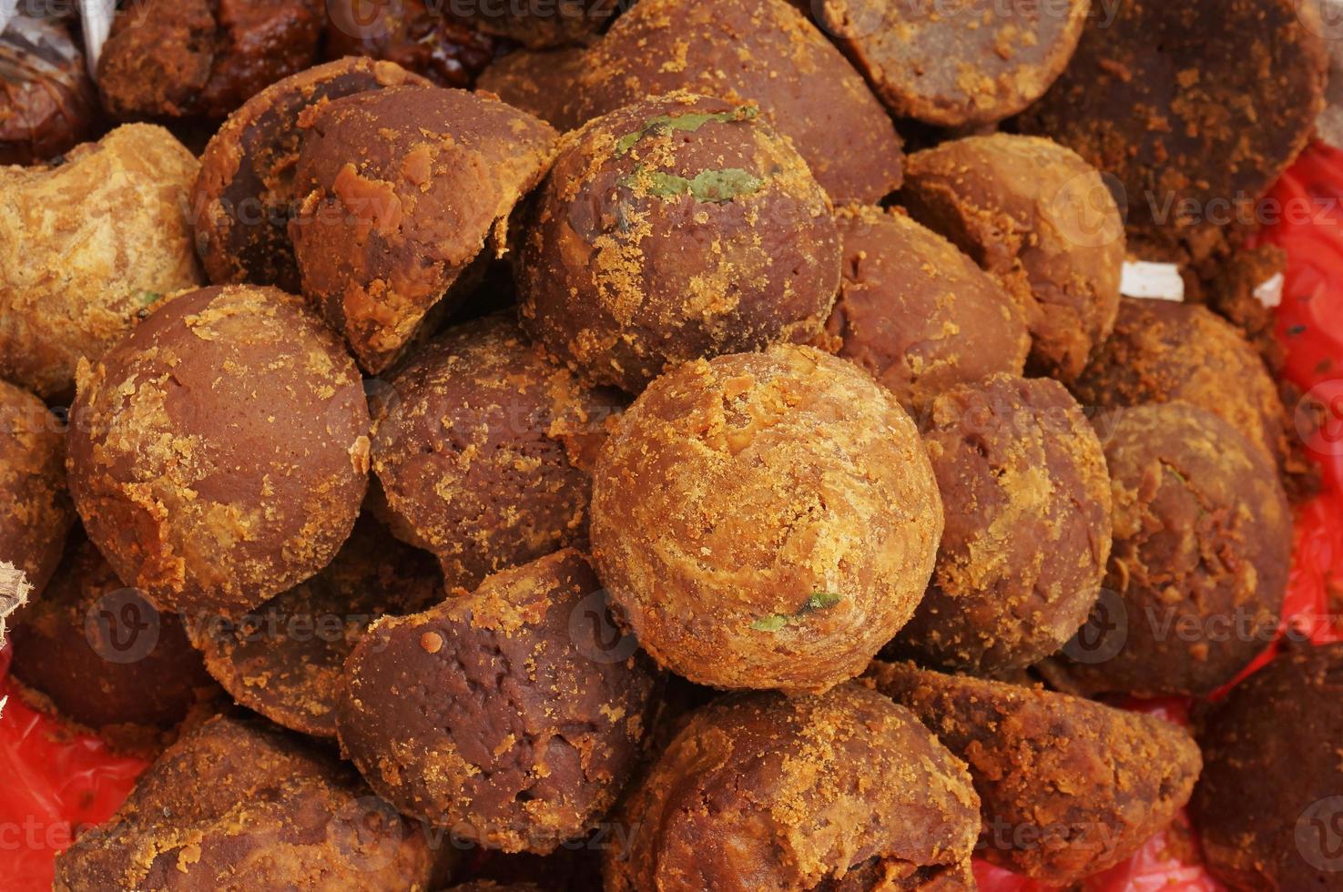 Organic palm sugar or Jaggery from south sulawesi, Indonesia,  sell in traditional market. photo