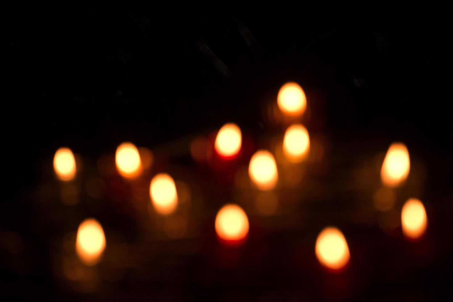 Blurred image of candle lights photo