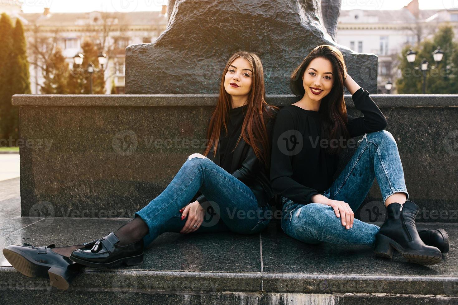 Two young adult girls photo