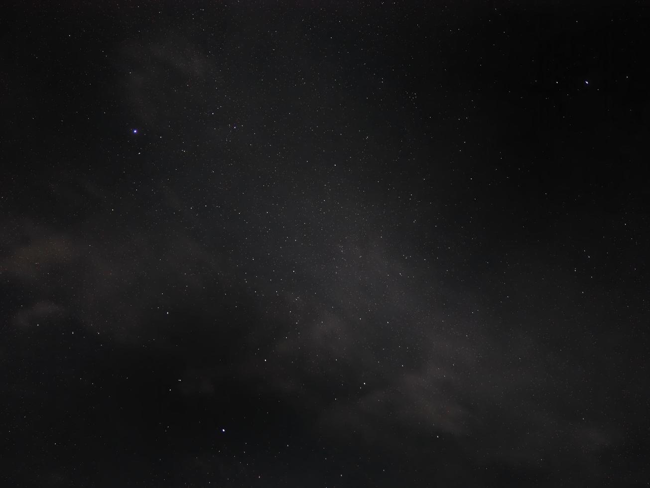 Low Angle view of Night starry sky and space dust in the universe, cosmos, Dark background, Night shot of constellation photo