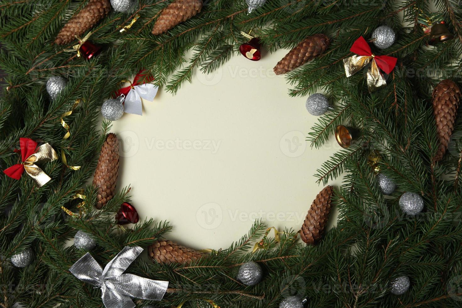 Holidays greeting card or banner composition with pine tree branches. Merry Christmas background and Happy New Year 2023. photo