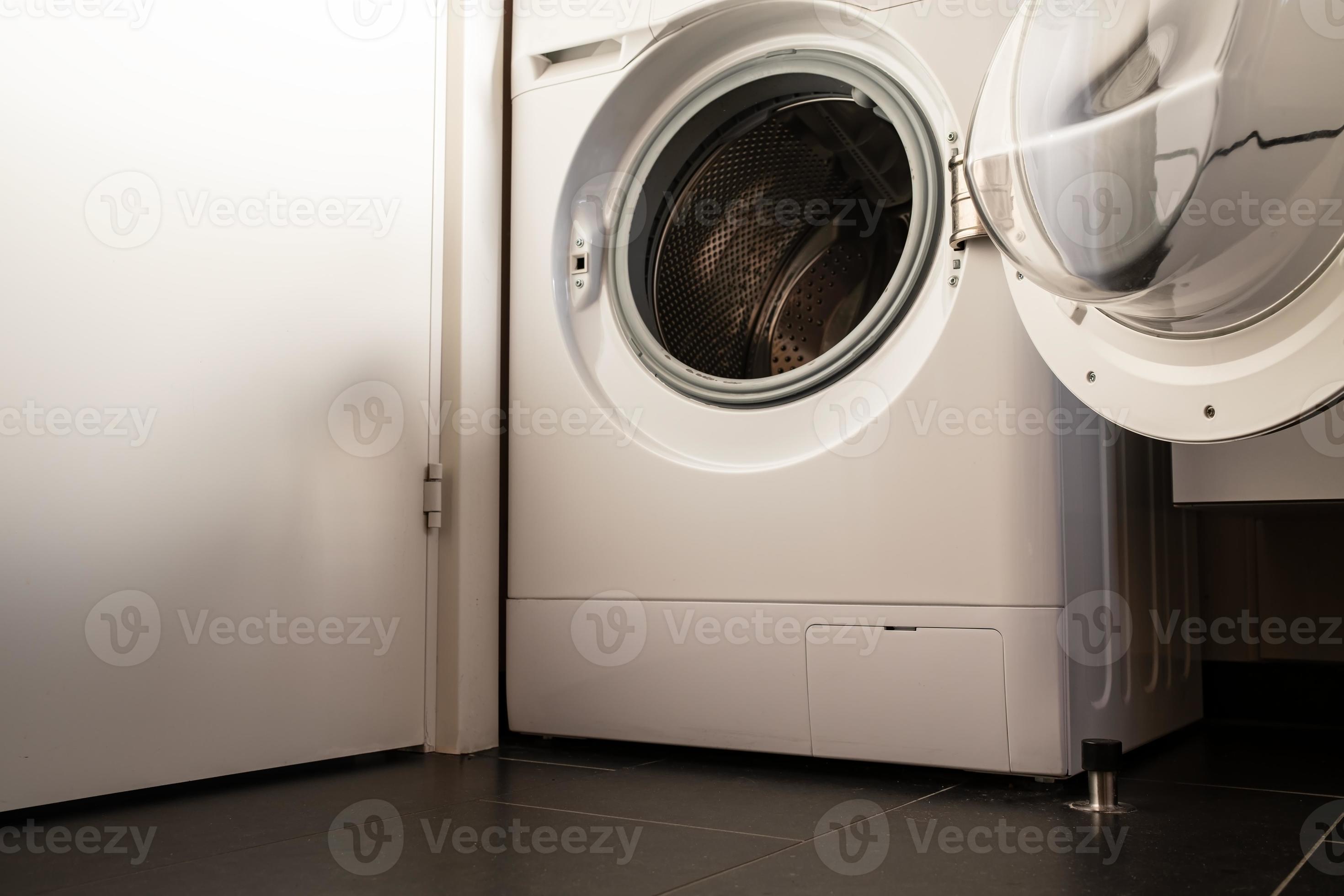 Empty open washing machine. Drying and airing the washer machine after