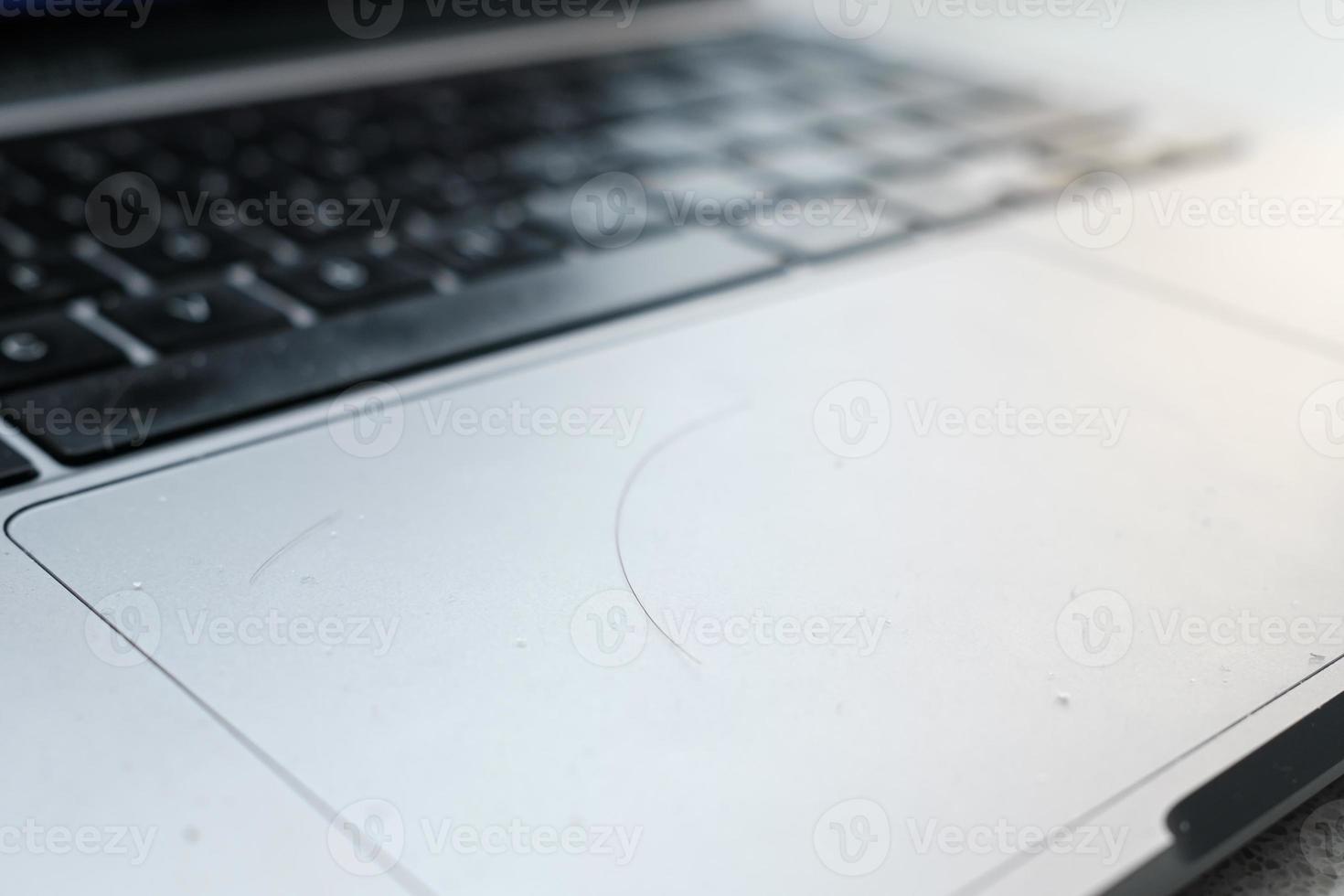 Dandruff and hair on the laptop. Work stress concept. photo