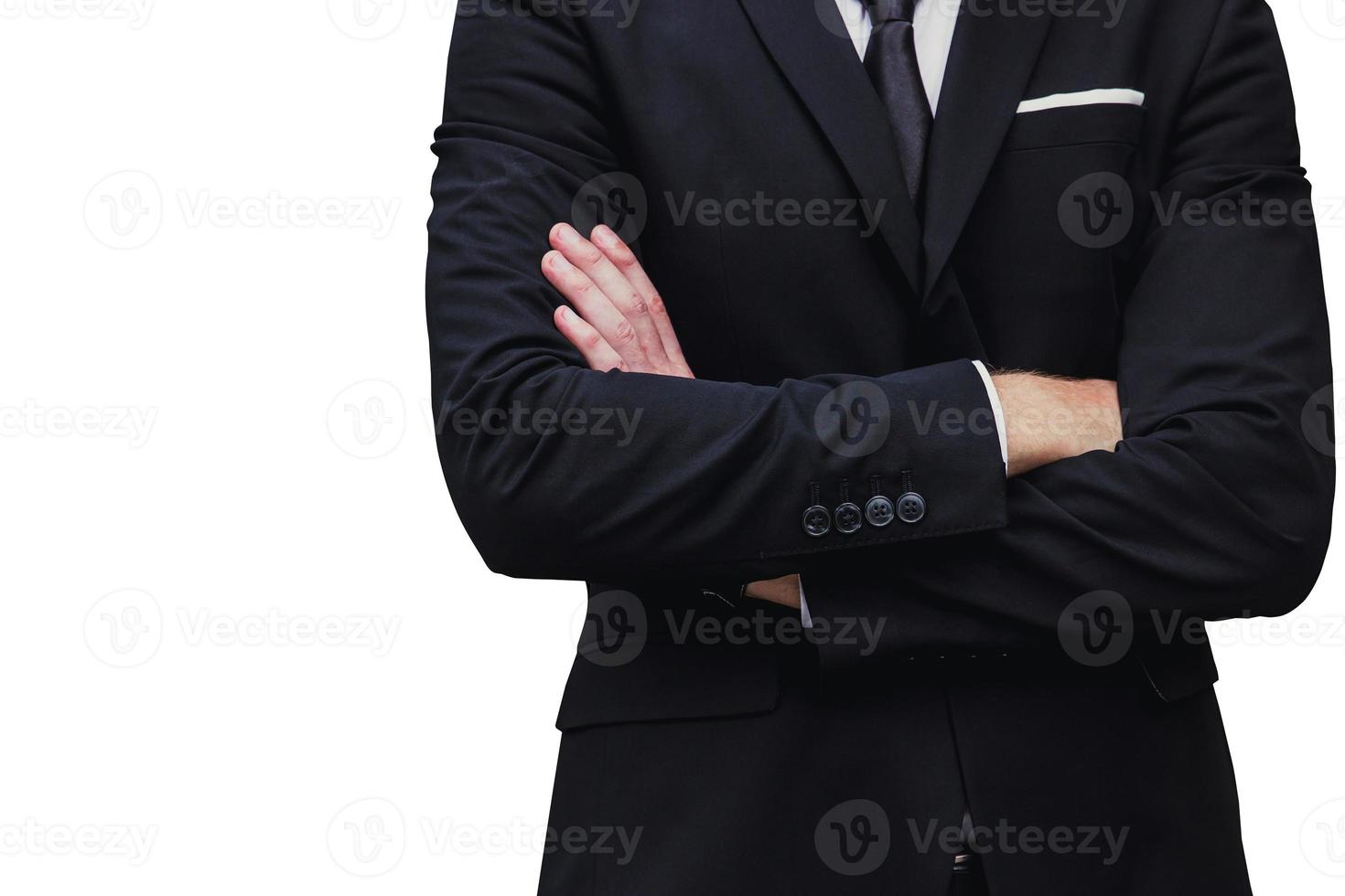 gentle serious working manager businessman arms cross isolated on white background photo