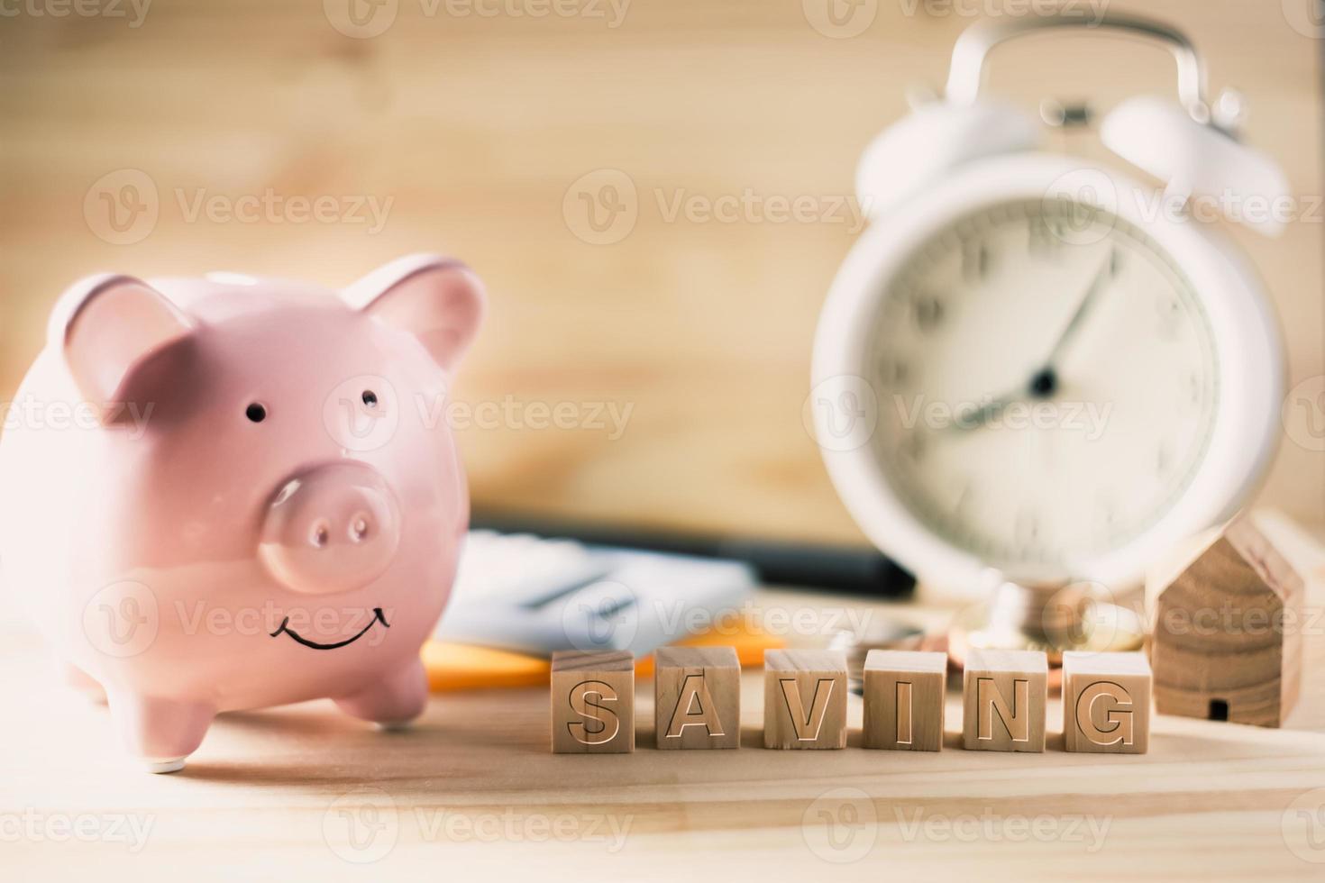 Time to Saving money with Piggy bank concept photo