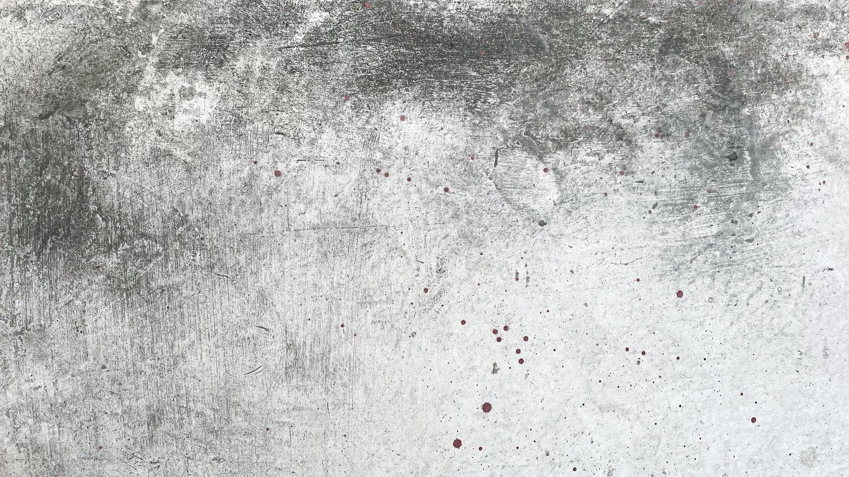 Stains on the grey wall texture background, from water and house paint. photo