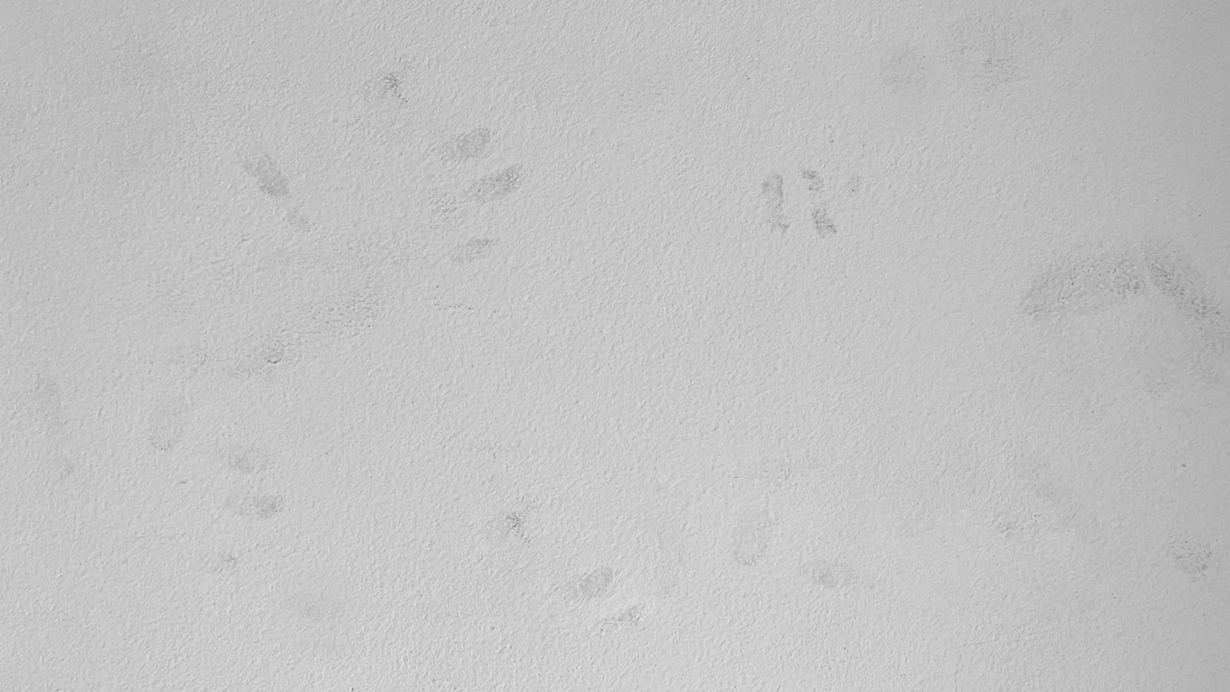 Stains on the grey wall texture background, from fingers. photo