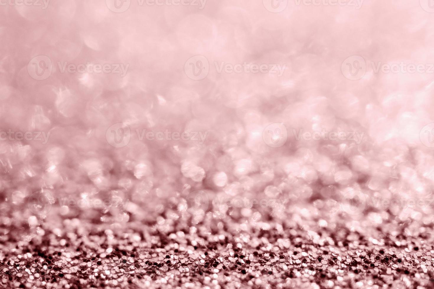 Textura de brillo de oro rosa abstracto con fondo bokeh foto