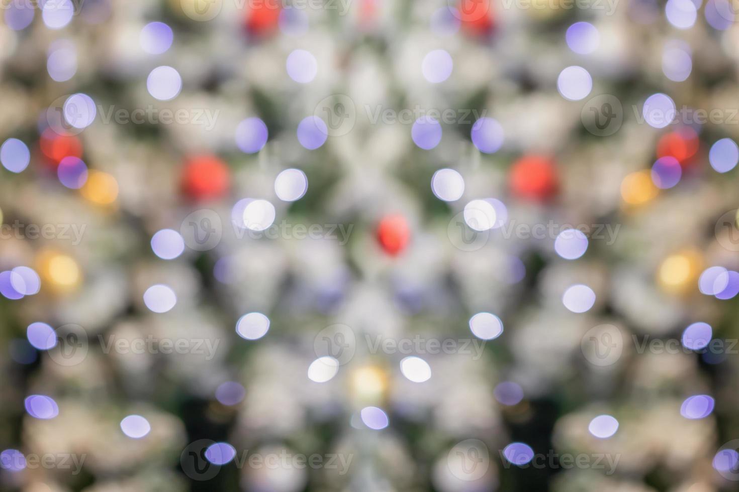 Abstract blurred christmas tree with bokeh light background photo