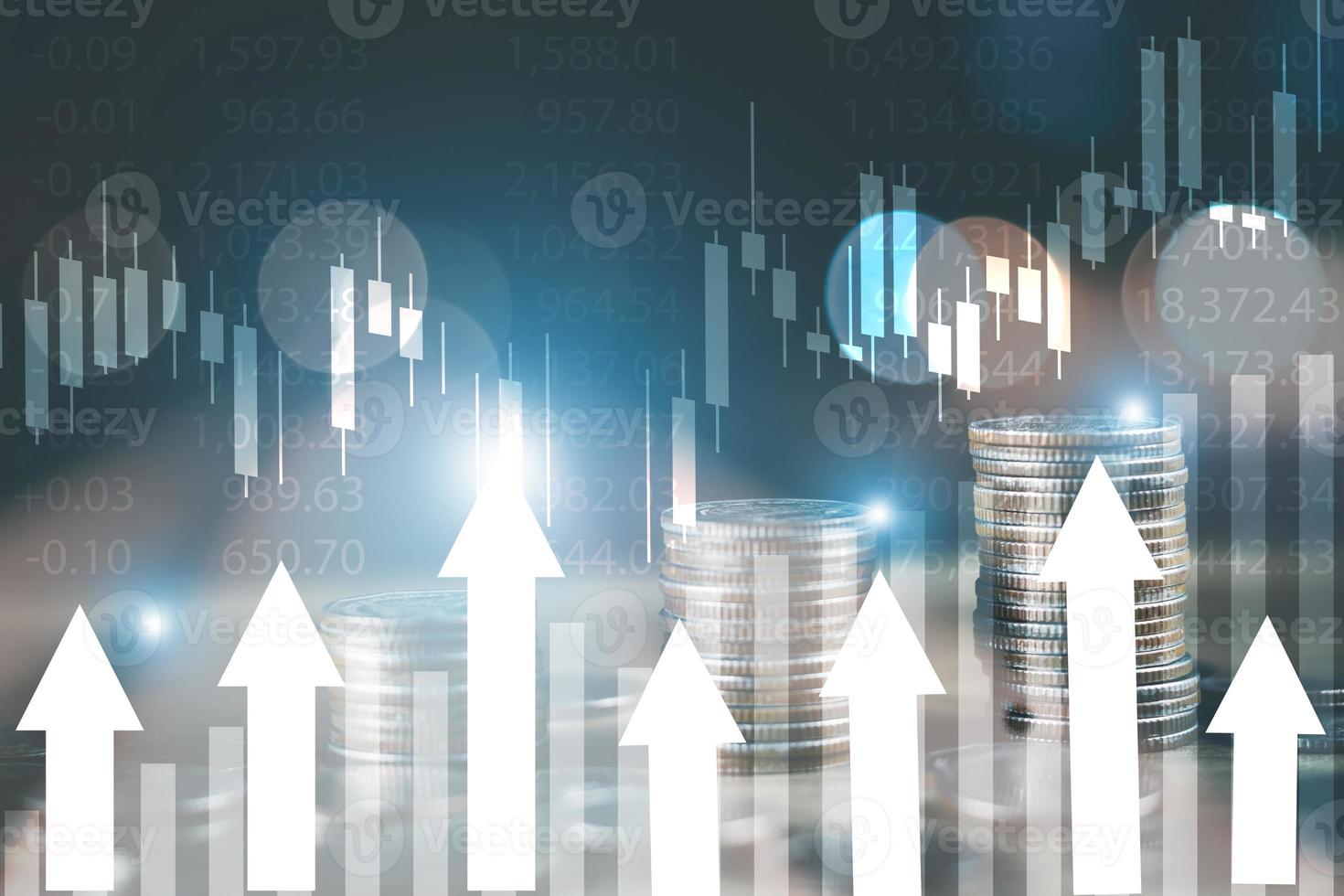 Financial stock market graph and rows of coins concept rows of coins lined up There is a graph showing growth and savings to plan for independent spending photo