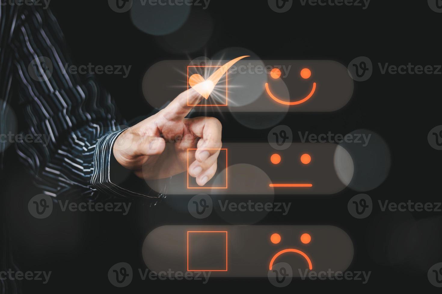 Customer service and Satisfaction concept Men's hands doing online assessments in the satisfaction rating the popular service company allows customers in order to improve and develop the organization photo