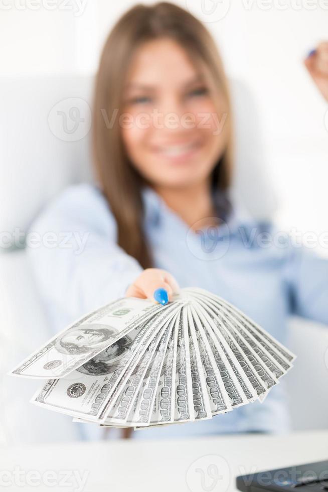 exitosa mujer de negocios con dólar foto