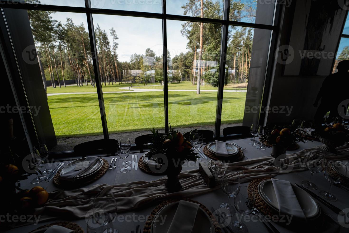 View of the lawn through the window of the banquet hall photo