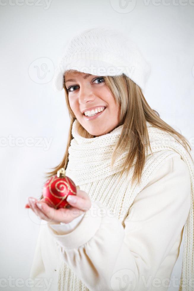Woman Holding Christmas Decoration photo