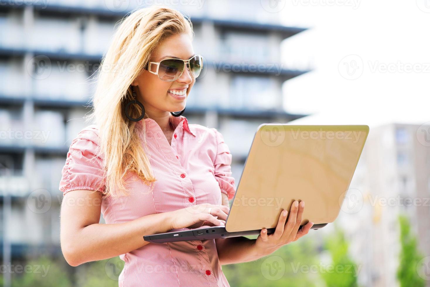 Woman with laptop photo