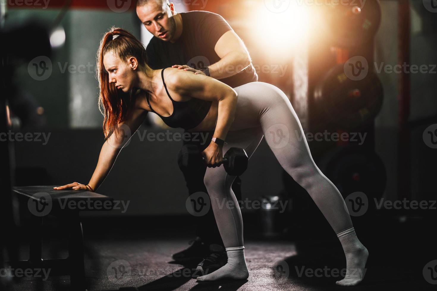Fitness Instructor Working With Clients photo