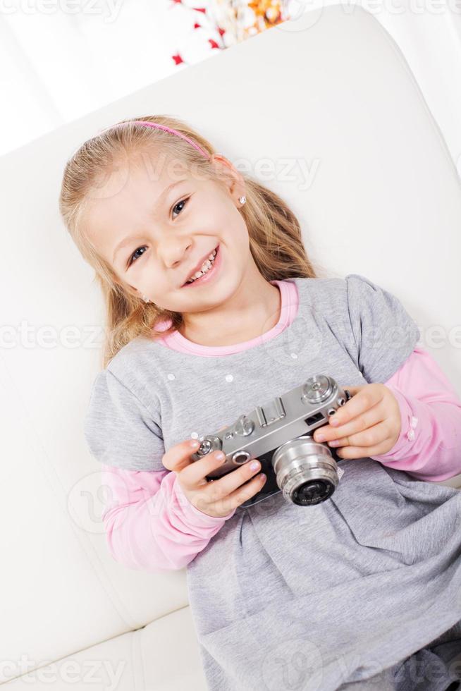 Little Girl With A Retro Camera photo