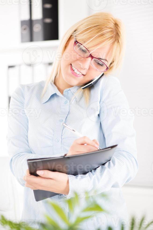 Busy businesswoman view photo