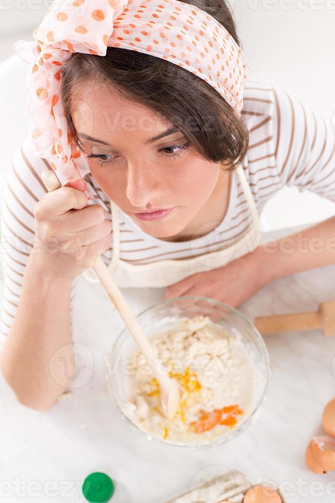 Young Woman Making Dough photo