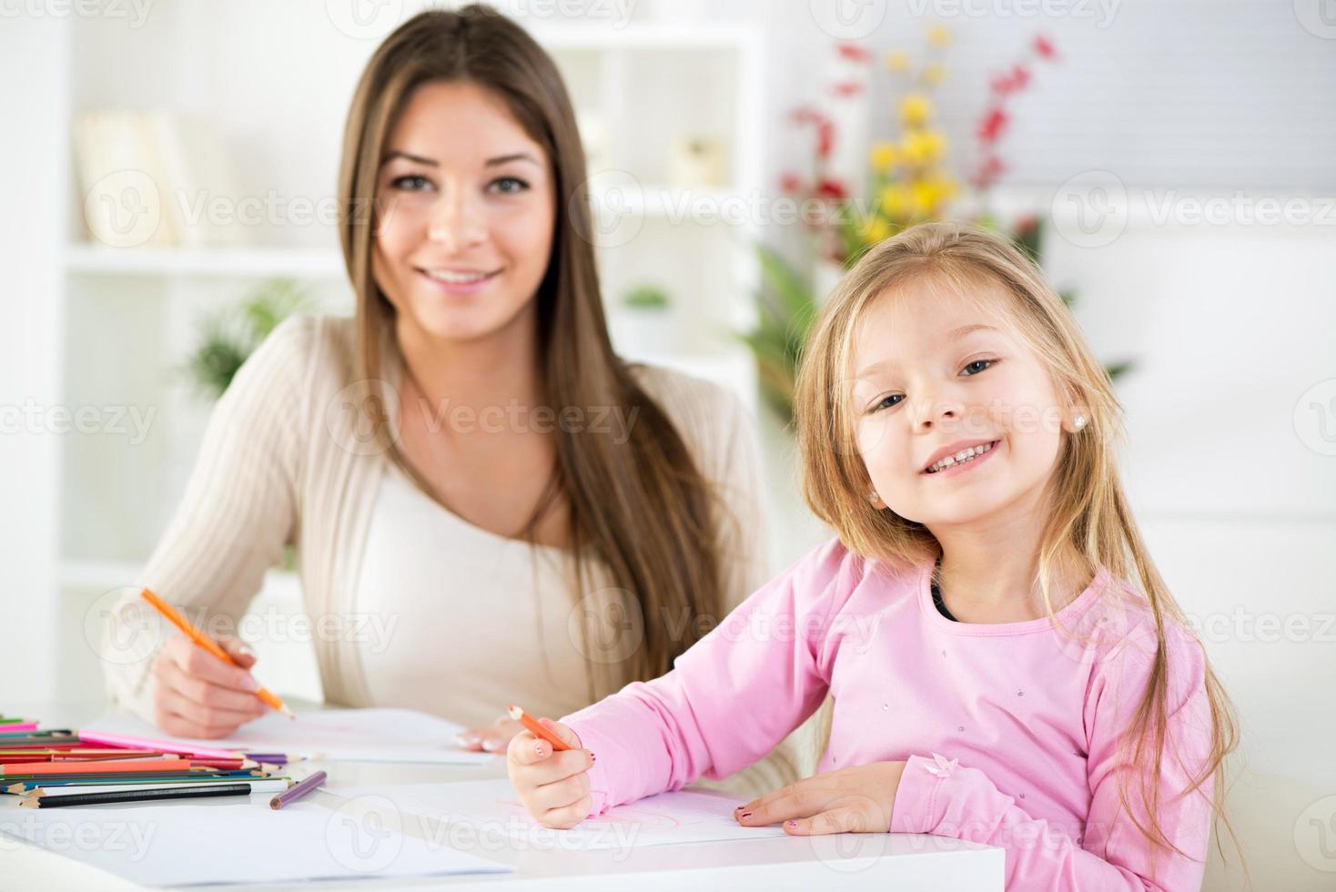 Cute little girl with mother photo