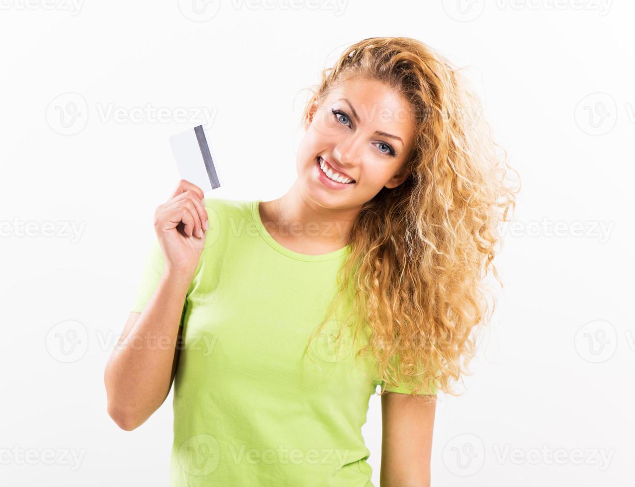 Cute girl with credit card photo