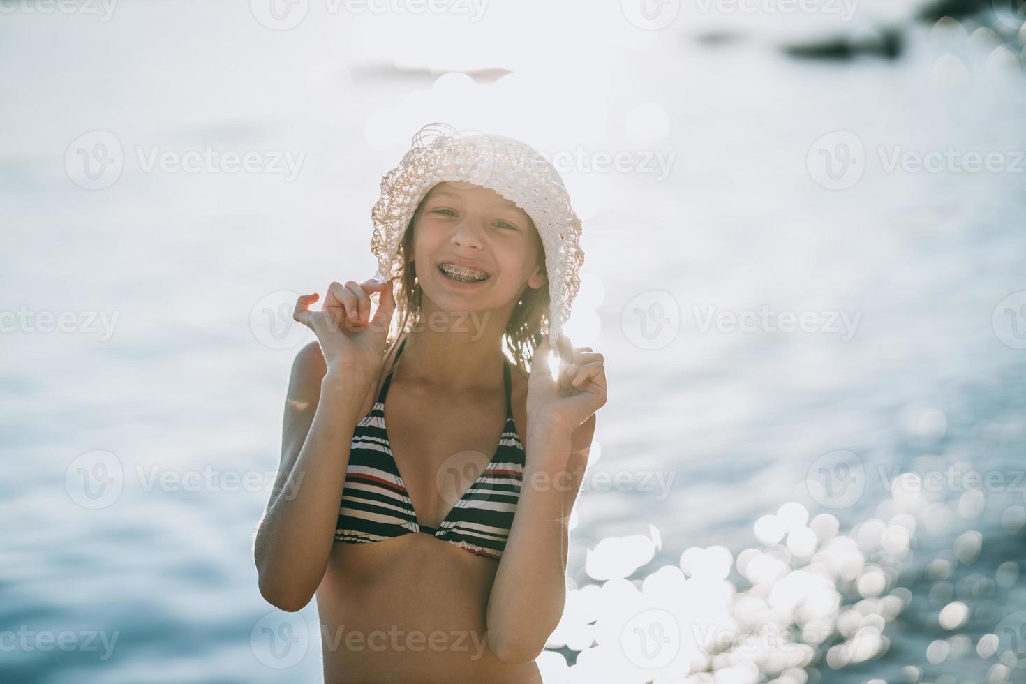 Teen Girl Having Fun At The Beach photo