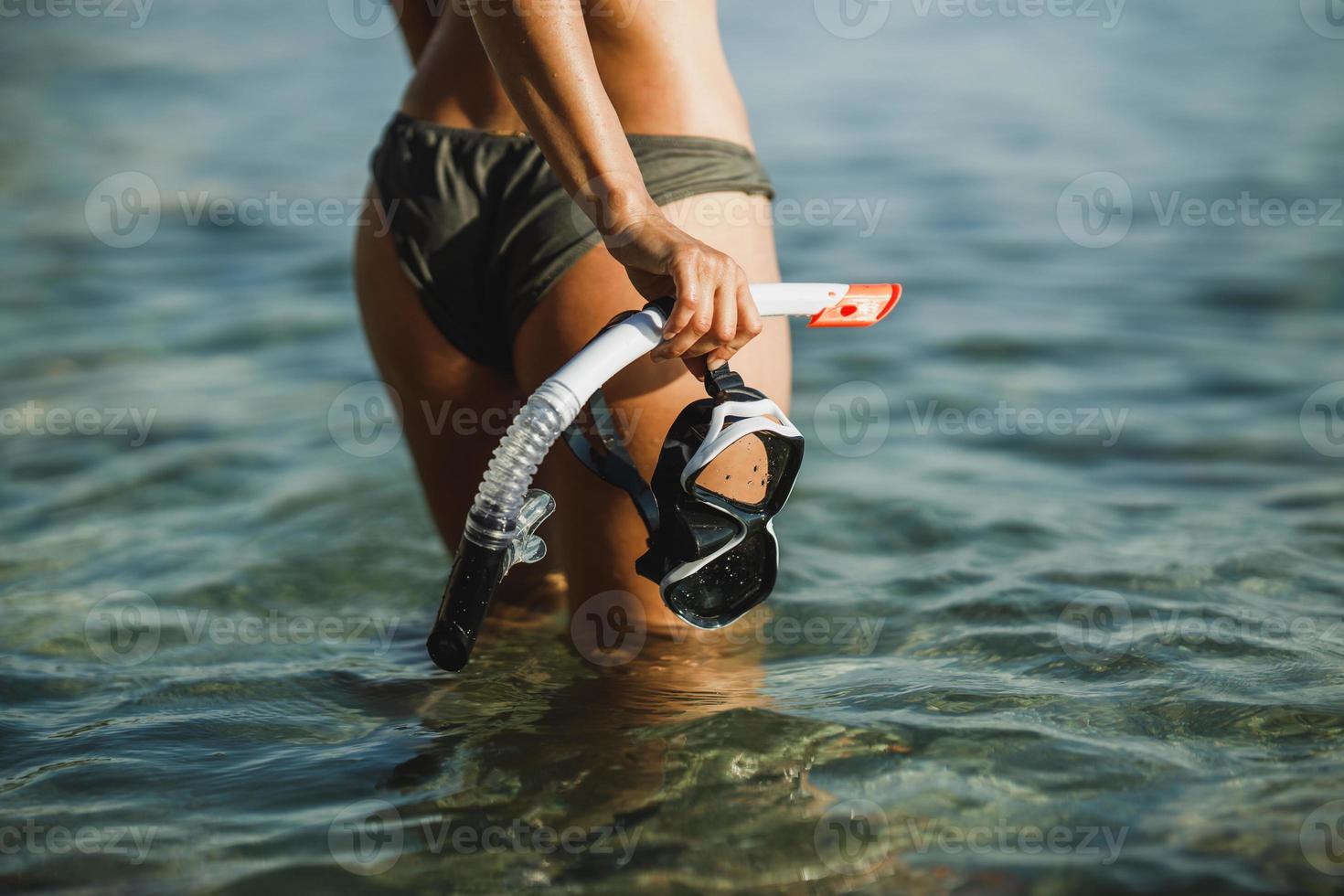 Close-up Of A Woman With Mask And Snorkel photo