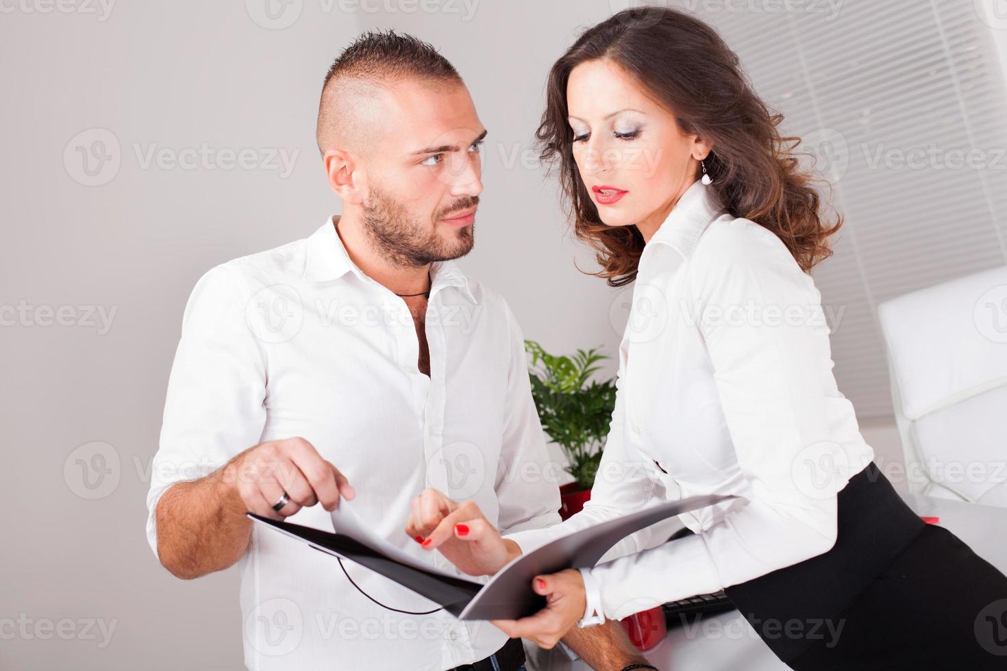Business people talking about a job photo