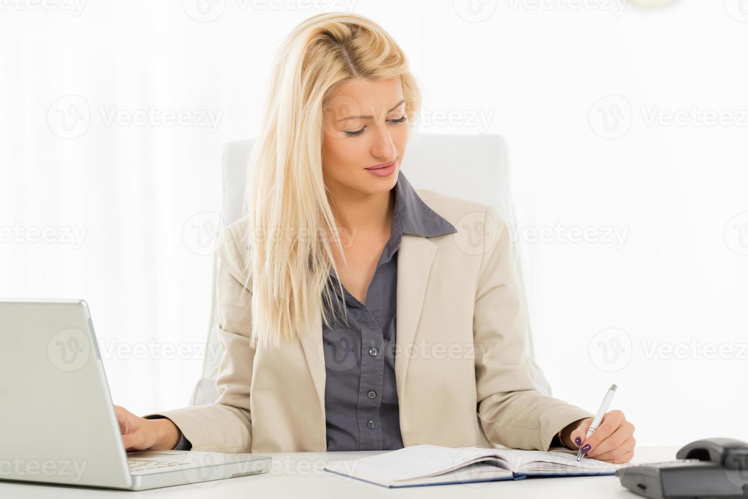 Left-Handed Businesswoman view photo