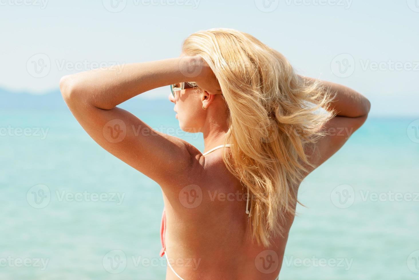Young woman in the beach photo