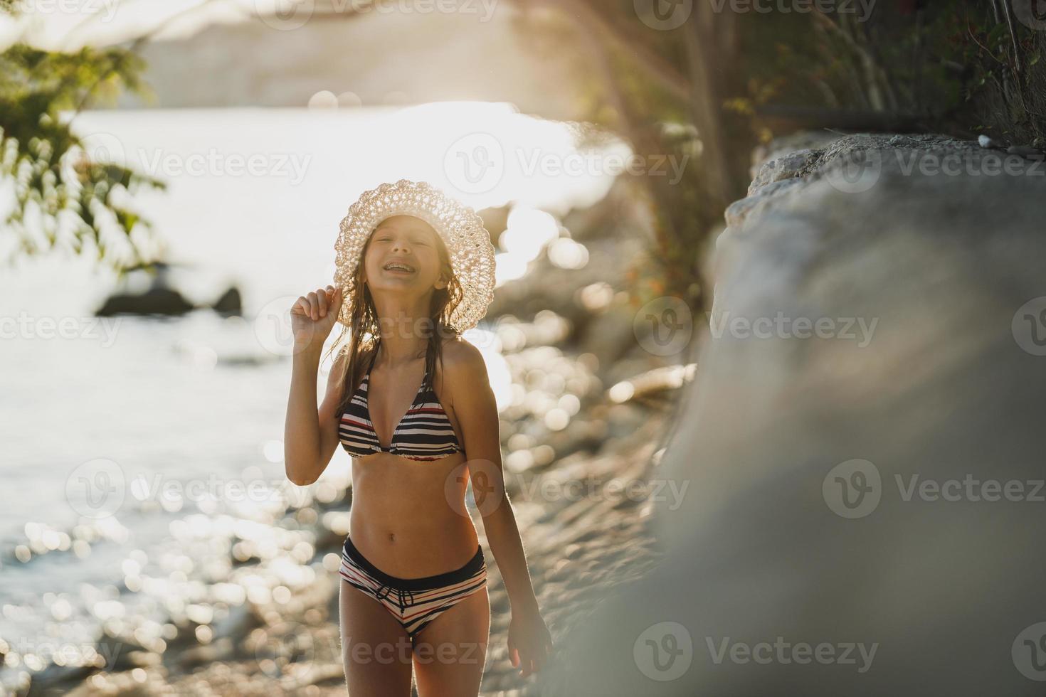 Teenager Girl Enjoying At The Beach photo