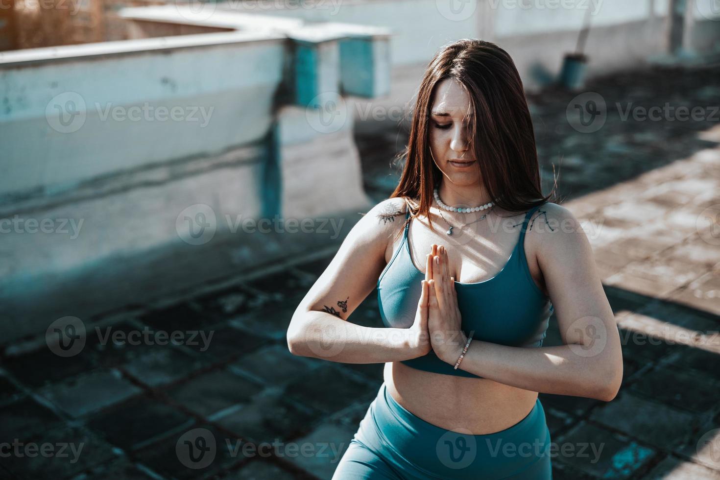 Woman Doing Yoga Outdoors photo