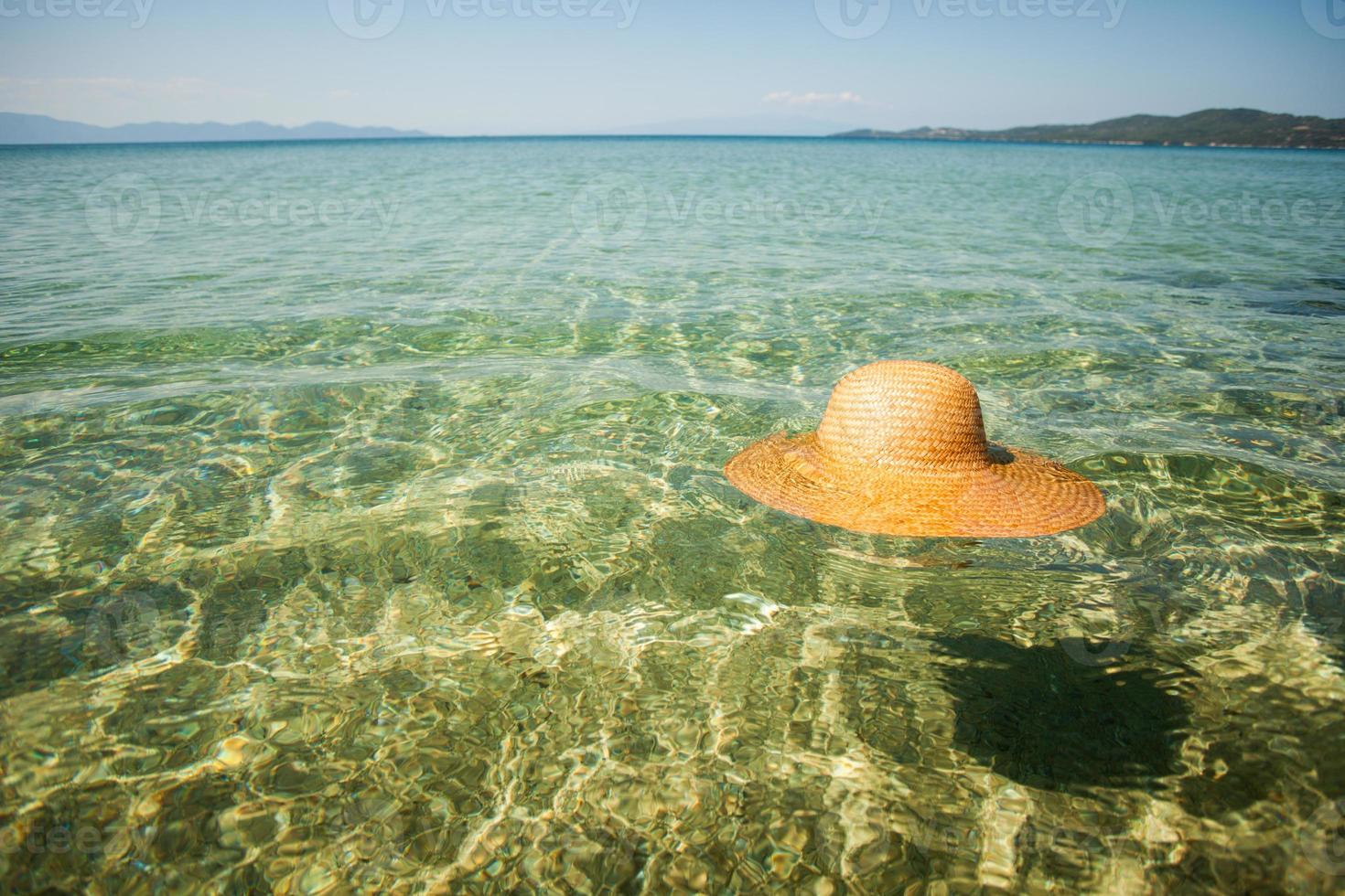 Sun hat in the sea photo